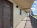Hallway leading to condo unit 203 at 2100 Ocean Shore Blvd # 203, Ormond Beach, FL 32176
