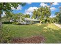 Ranch style home with spacious yard and mature trees at 235 Oakdale St, Windermere, FL 34786