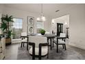 Bright dining room with modern table and chairs, perfect for Gathering gatherings at 2393 Appy Ln, Apopka, FL 32712