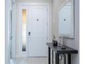 Modern entryway with a clean design and ample natural light at 7514 Sunflower Cir, Kissimmee, FL 34747