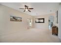 Bright dining room with neutral decor and carpeted floor at 1033 Hacienda Cir, Kissimmee, FL 34741
