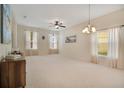 Spacious living room with neutral tones and lots of natural light at 1033 Hacienda Cir, Kissimmee, FL 34741