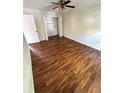 Bedroom with wood-look flooring and ceiling fan at 1944 Conway Rd # 6, Orlando, FL 32812