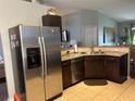 Kitchen with stainless steel appliances and granite countertops at 50989 Highway 27 # 366, Davenport, FL 33897