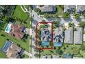Aerial view of a house with a pool in a residential neighborhood at 16328 Wind View Ln, Winter Garden, FL 34787