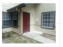Exterior view of building with entrance at 4113 Enchanted Oaks Cir # 1216, Kissimmee, FL 34741