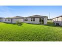 Large backyard with lush green grass at 1170 Yumuri St, Winter Haven, FL 33884