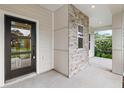 Modern front door with glass panels at 634 Burch Ave, Winter Garden, FL 34787