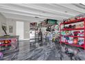 Finished garage with epoxy flooring and ample storage at 1069 River Otter Way, Deland, FL 32720