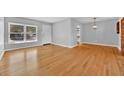 Spacious living area featuring hardwood floors and an open floor plan at 2811 Vine St, Orlando, FL 32806