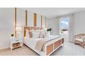 Serene bedroom with a queen bed and window seat at 2204 Tongass Bnd, Davenport, FL 33837