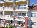 Condo building with multiple balconies at 1112 Sunset View Cir # 302, Reunion, FL 34747