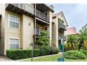 Building exterior showcasing landscaping and balconies at 200 Afton Sq # 107, Altamonte Springs, FL 32714