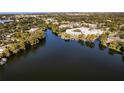 Aerial view of waterfront community with calm waters at 1818 Mondrian Cir, Winter Park, FL 32789