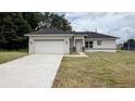 One-story home with attached garage at 4914 Sw 147Th Loop, Ocala, FL 34473