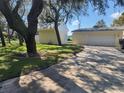 Detached garage and shed in backyard at 14902 Arrena Rd, Winter Garden, FL 34787