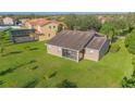Aerial view of a house with a large backyard and pool at 3070 Silver Fin Way, Kissimmee, FL 34746
