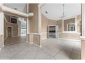 Formal dining room with tile floors and a view into the kitchen at 2128 Lake Crescent Ct, Windermere, FL 34786