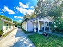 View of house and driveway at 301 N Westmoreland Dr, Orlando, FL 32805