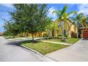 Community view of homes and landscaping at 221 Las Fuentes Dr, Kissimmee, FL 34746
