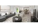 Open living and dining area with modern decor at 1242 Normandy Dr, Haines City, FL 33844