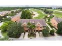 Townhouse with two-car garage situated near golf course at 7582 Assembly Ln, Reunion, FL 34747