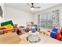 ' playroom with lots of toys and colorful decor at 1220 Sugarwood St, Davenport, FL 33837