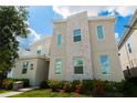 Modern two-story home with stone accents and landscaping at 2816 Simile St, Kissimmee, FL 34746