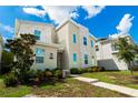 Modern two-story home with stone accents and landscaping at 2816 Simile St, Kissimmee, FL 34746