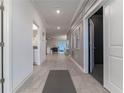 Bright hallway with tile floors and access to other rooms at 2816 Simile St, Kissimmee, FL 34746