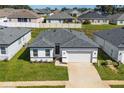 Aerial view of a one-story home with gray roof at 4475 Nw 1St Ter, Ocala, FL 34475