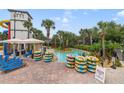 Community lazy river with numerous tubes for leisure at 3144 Wet N Wild Ct, Kissimmee, FL 34746