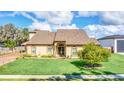 Lakefront home with two-car garage and landscaped yard at 621 E Wildmere Ave, Longwood, FL 32750