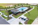 Community pool and surrounding amenities at 6118 Galloping Dr, Apopka, FL 32712