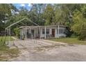 Cozy one-story home with covered patio and yard at 621 Oaklando Dr, Altamonte Springs, FL 32714