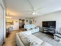 Living Room with light colored couches at 1512 S Pine Ridge Cir # B1, Sanford, FL 32773