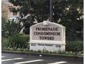 Promenade Condominium Towers building entrance sign at 6312 Buford St # 304, Orlando, FL 32835