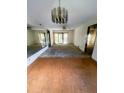 Spacious living room with large windows and patio access at 50 Sheoah Blvd # 34, Winter Springs, FL 32708