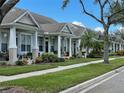 Row of charming homes with well-maintained lawns at 6542 Merrick Landing Blvd, Windermere, FL 34786