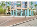 Building entrance with brick walkway and awning at 322 E Central Blvd # 1807, Orlando, FL 32801