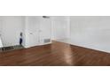 Bright living room with wood-look floors and an open floor plan at 2319 Continental Blvd, Orlando, FL 32808