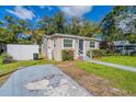 House exterior showcasing a side view and driveway at 1506 W 16Th St, Sanford, FL 32771
