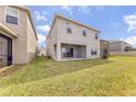 Spacious backyard with a large patio at 1250 Island Slough Ln, Davenport, FL 33837