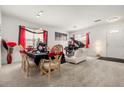 Elegant dining room with a piano and tasteful decor at 348 Sand Ridge Dr, Davenport, FL 33896