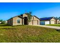 Newly built home with two-car garage at 207 Goldenrod Ln, Kissimmee, FL 34759