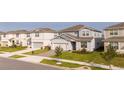 Two-story house in a neighborhood of similar homes at 5653 Oak Knoll Dr, St Cloud, FL 34771