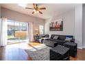 Bright living room with sliding doors leading to pool area at 8581 Bay Lilly Loop, Kissimmee, FL 34747