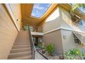 Building exterior with stairs and landscaping at 120 Hibiscus Woods Ct # 8D, Deltona, FL 32725