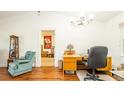 Bright home office with hardwood floors and built-in desk at 796 Humphrey Cir, Deltona, FL 32738