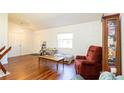 Comfortable living room with hardwood floors and cozy seating at 796 Humphrey Cir, Deltona, FL 32738